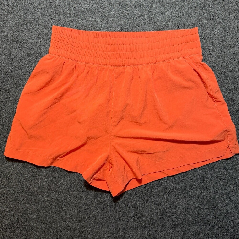 Athleta High Rise Weekender Run Shorts Womens S Orange Coral Lined Pockets